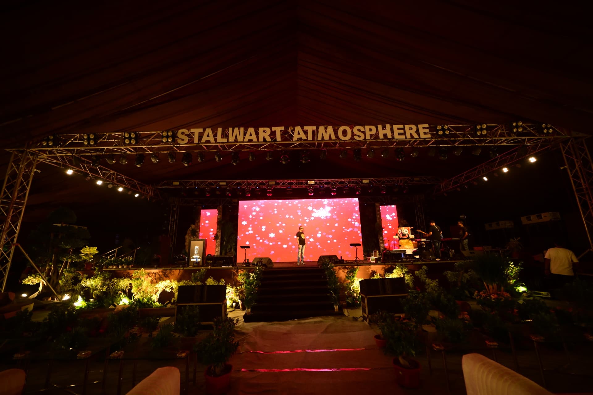 Event stage production with colourful lighting and live performance